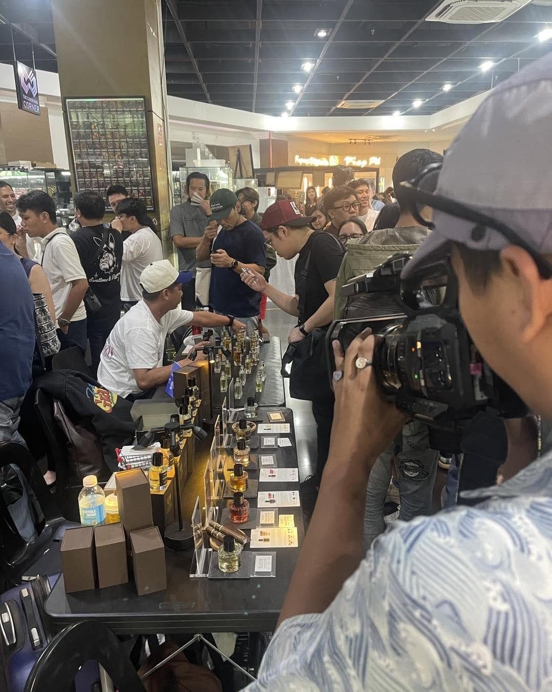 Guests trying Valor Extrait at a fragrance event